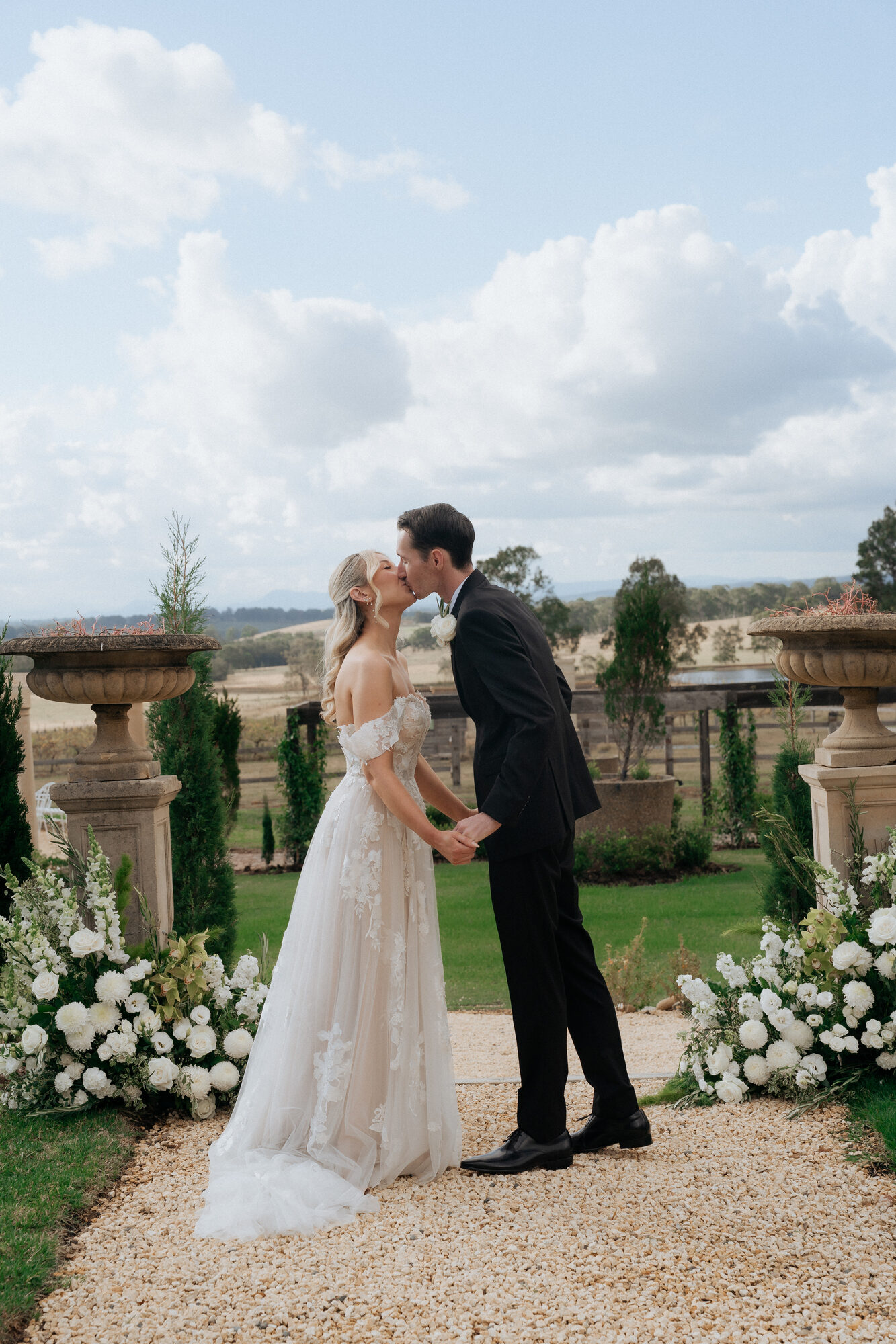 El and Craig's first kiss as husband and wife — Villa Toscana wedding ceremony, Hunter Valley