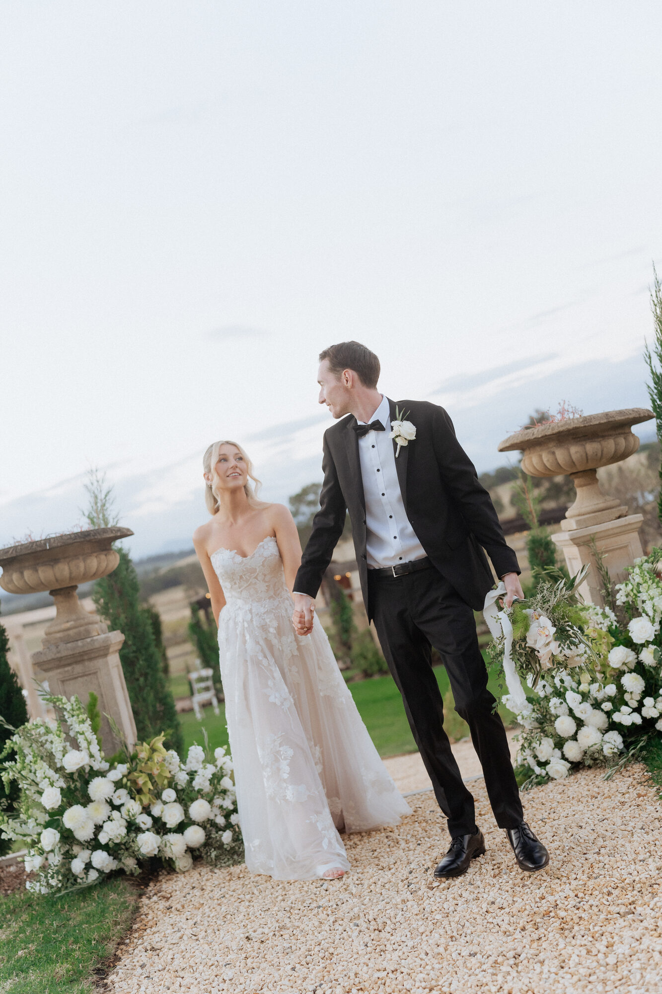 El and Craig in the Villa Toscana gardens at golden hour — Hunter Valley wedding